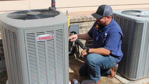 Maintenance-Plans-Callout-3-480×270 Country Thyme tech servicing a Lennox AC